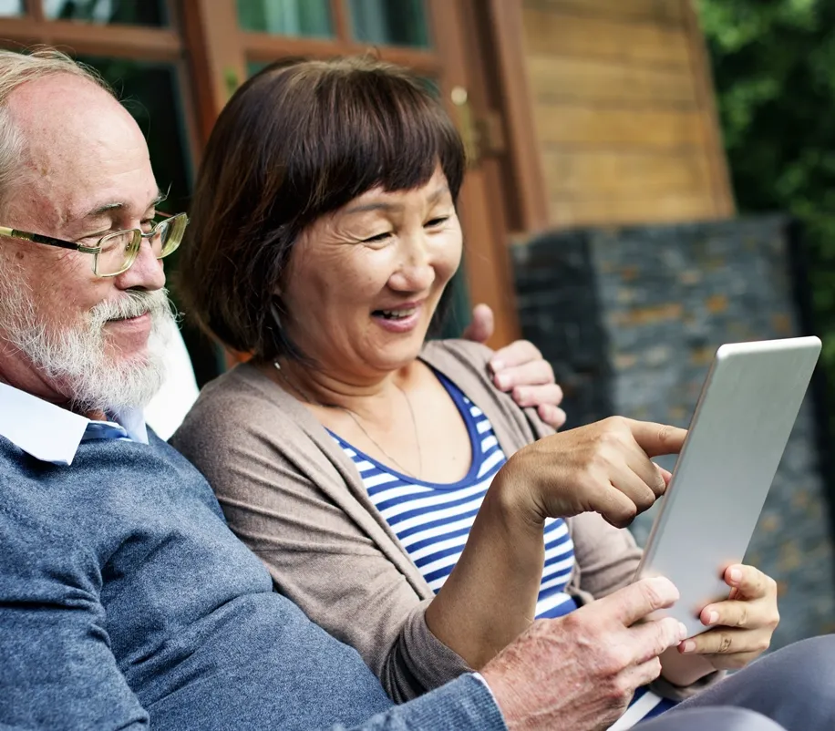 Couple using a tablet.
